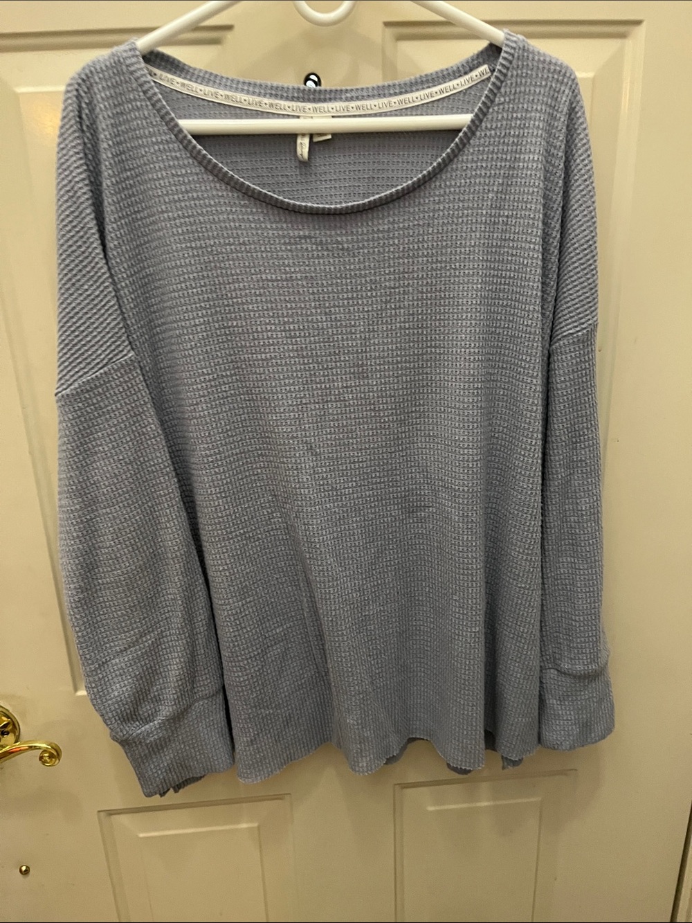 Light Blue Waffle Knit Long Sleeve Women's Top and Bottoms with button trim.